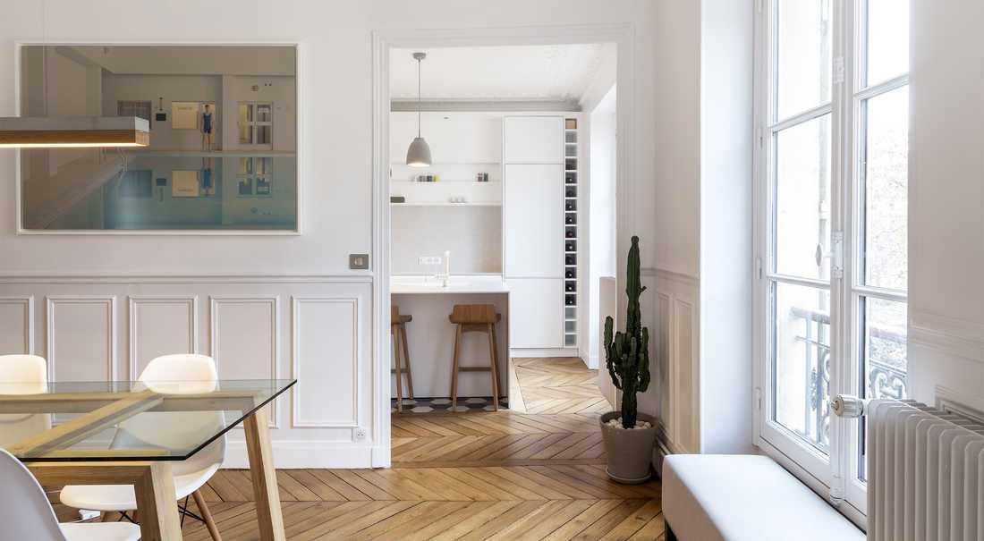 Aménagement d'un cuisine ouverte dans un salon par un architecte à Bordeaux
