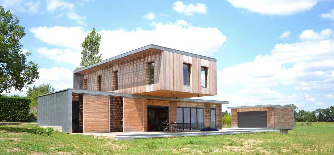 Maison contemporaine écologique en bois et béton en Gironde